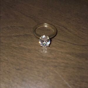 Elegant Gold Ring with Clear Stone